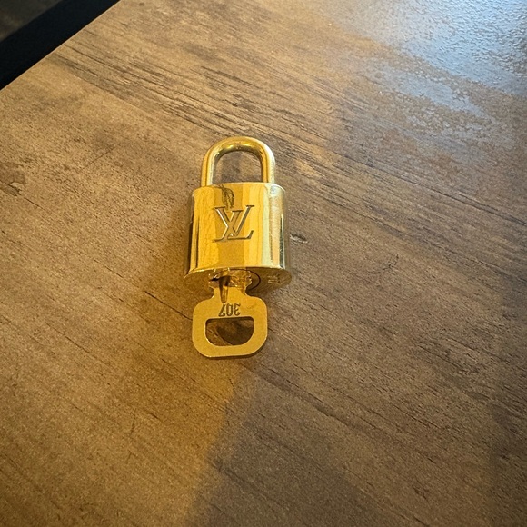 Louis Vuitton Gold Padlock - Picture 1 of 3